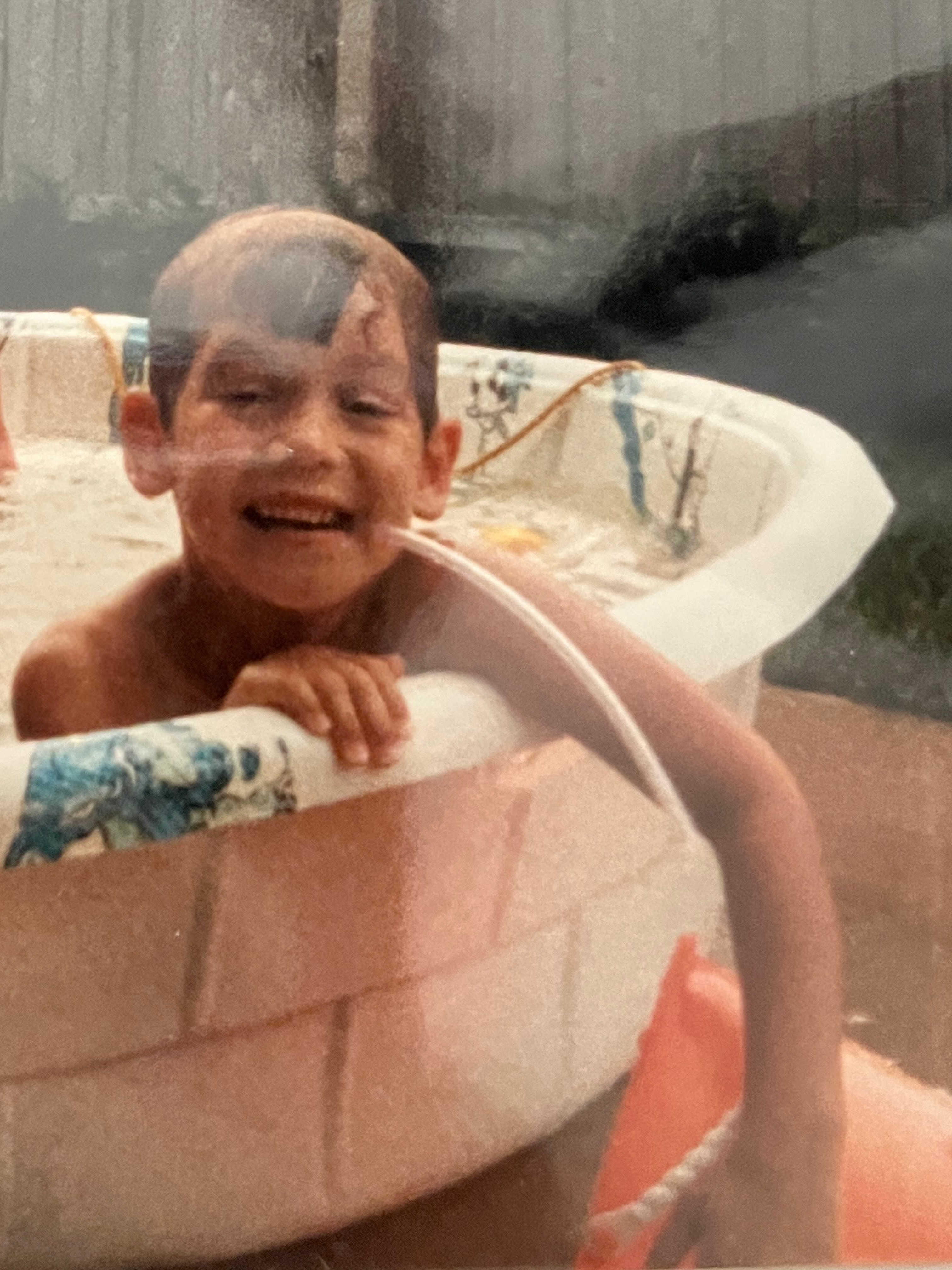 Young Craig in a kiddie pool, Wildwood